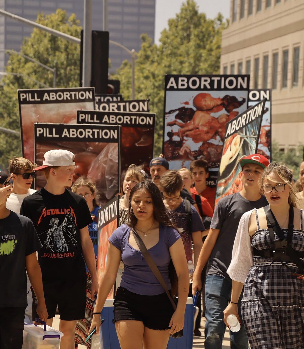 BryanKemper's tweet photo. Today @TheSurvivors_US and @rockforlife were outside the UCLA Medical Center abortion mill to protest child killing and the fetal tissue research that goes on there. Expose Evil! https://t.co/ugoZJotEmH