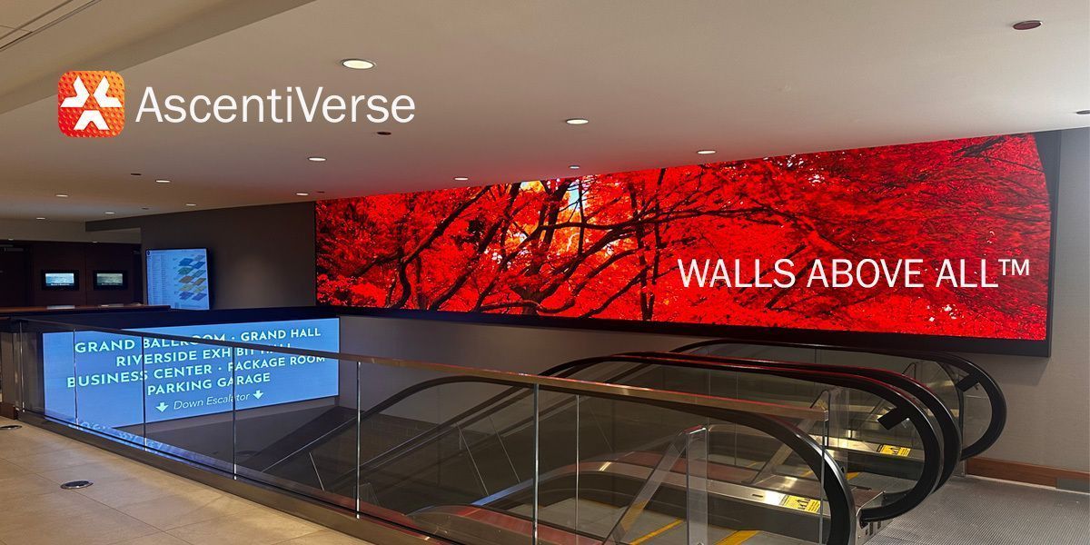 AscentiVerse's tweet photo. Spanning an impressive 27 feet along the wall adjacent to the elevators at @HyattChicago, this LED display was thoughtfully integrated just above the ceiling soffit, creating a crisp architectural reveal and the striking illusion of a seamless, suspended digital plane.

A smaller adjacent display provides dedicated directional signage. Carefully engineered around existing wall constraints, both displays integrate seamlessly with the architecture while maintaining excellent visibility from the platform level and for guests descending the escalator.

By fully activating the available vertical space, the installation transforms an otherwise understated area into a captivating, high-impact visual experience.

General Contractor: #BulleyandAndrews
Architect: @DLRGroup

#DigitalSignage #WallsAboveAll