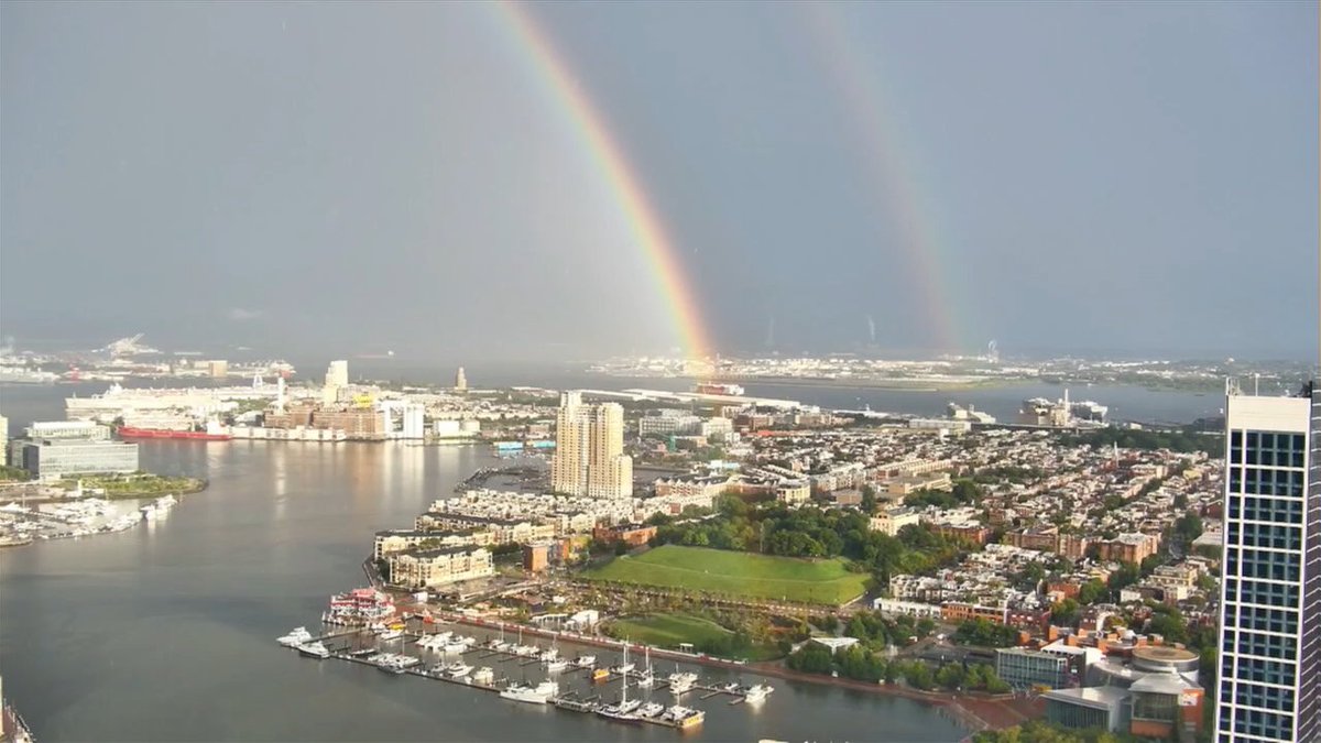 FOXBaltimore's tweet photo. SPOTTED: Double rainbow from our Inner Harbor camera after storms swept through 🌈☔ 

Weather Alert: https://t.co/Egxej3QJOv https://t.co/bLs5Cuggpz