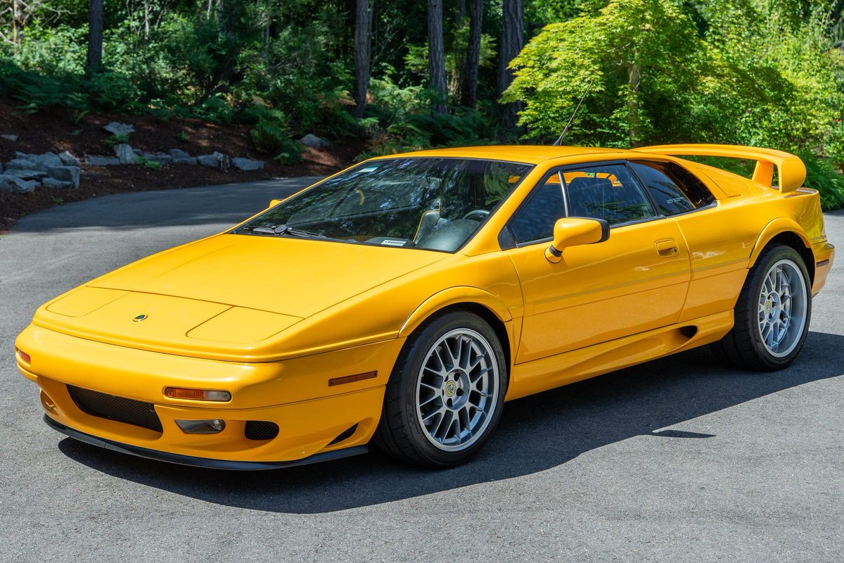 Bringatrailer's tweet photo. Now live at BaT Auctions: 27k-Mile 2002 Lotus Esprit V8 25th Anniversary Edition. https://t.co/XQLYDP8GSc https://t.co/9LKIYuonYW