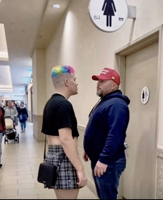JenBrettyler's tweet photo. This dad blocked this person from entering the girls' bathroom.

"My daughter is in there. You can't enter."

Do you agree with the father's attitude? https://t.co/Obrx14264b