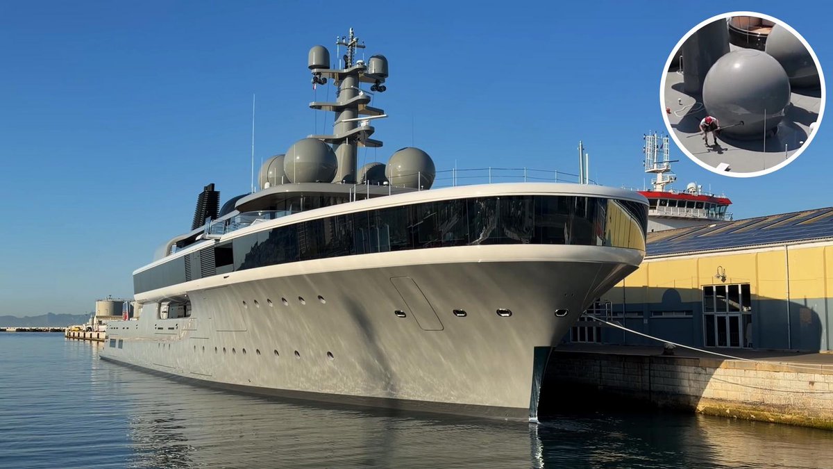 luxurylaunches's tweet photo. Penned by Apple Watch designer Marc Newson, this Japanese billionaire’s $500 million superyacht is so massive that its four giant radomes dwarf the maintenance crew, making deckhands look insect-sized as they carefully scrub the satellite shields- 
https://t.co/G5ZUi26mlf https://t.co/eqq1rWjZVr