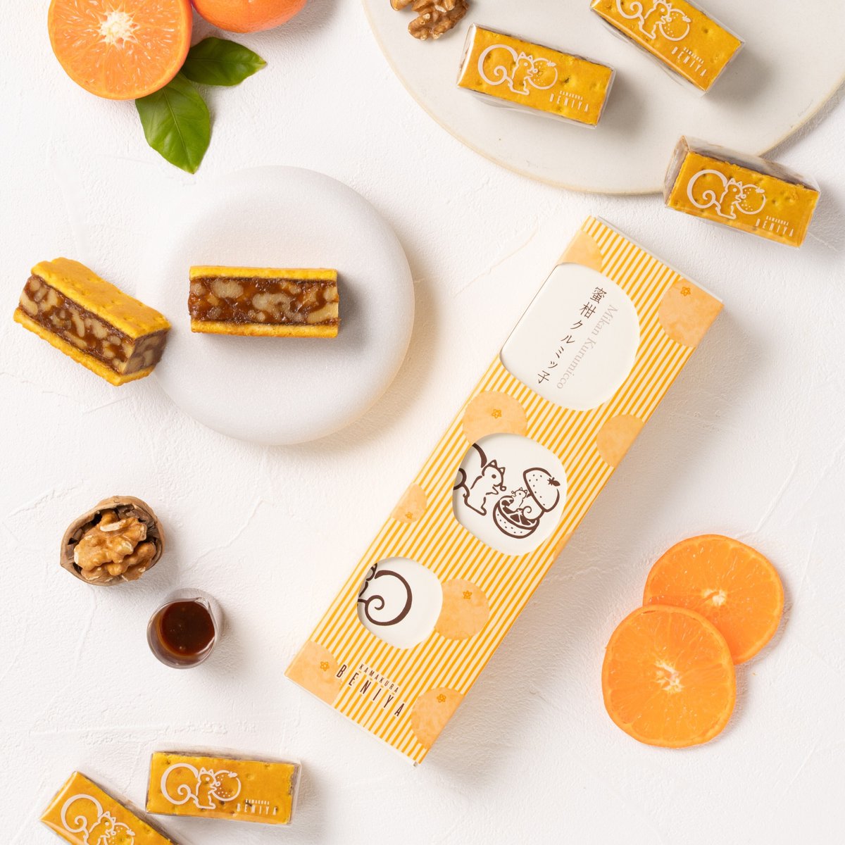 Kamakura_Beniya's tweet photo. 蜜柑クルミッ子🍊
事前WEB受注のお知らせ📣

クルミと自家製キャラメルを、温州みかんを使用したジャムと蜜柑風味の生地で挟んだ「蜜柑クルミッ子」🍊🐿

【八幡宮前本店・小町横路店 店頭受取分】の事前WEB受注(先着順)を本日7/29 12:00～受付しております。

お申込みは↓
https://t.co/lzrbyi9C2T https://t.co/gwiXH5ctT9