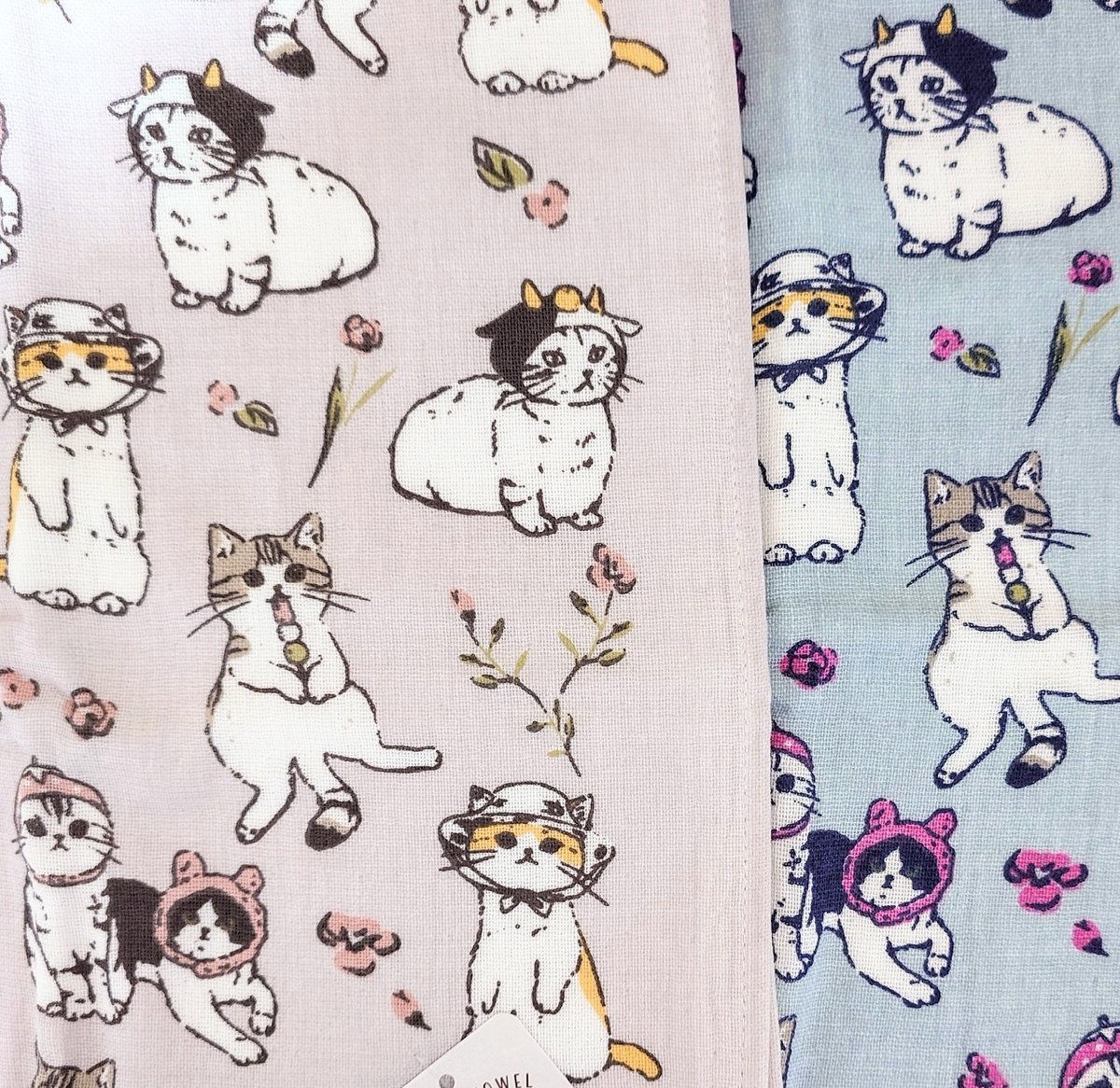 猫いっぱいのフェイスタオル。 よく使う、首にかけたりするあの一般的