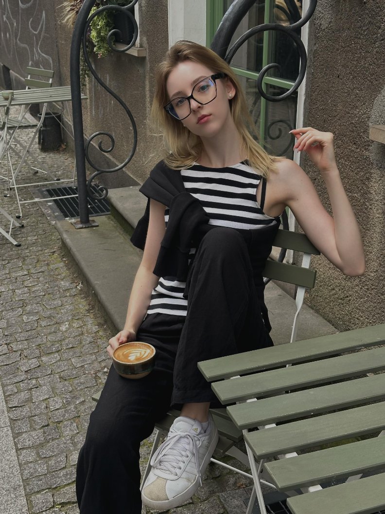 SilentHaltca0's tweet photo. Black and white striped tank with a black knit draped over, black frames on, just sat on a street bench and snapped a quick one. Cobblestones, latte art, all that effortless European street vibe, simple and just right 📸 https://t.co/jbmzE10E6C