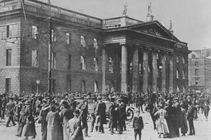 IRAHistoryArch's tweet photo. The Easter Rising.. On April 24, 1916, 12:30pm. Volunteers raised a tricolor over Dublin’s GPO. Pearse stepped outside and read a proclamation declaring a republic that didn’t exist yet. The first shots came 45 minutes later. https://t.co/rDtNGgruSr