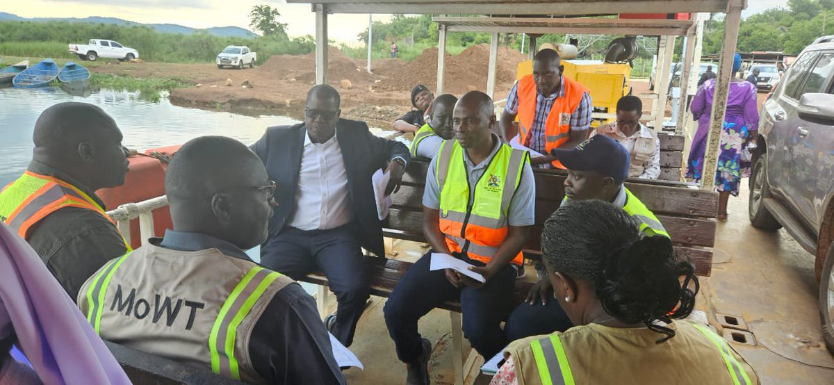 MoWT_Uganda's tweet photo. The Minister of State for Works, Hon. Siraj Ali, this morning inspected the proposed Laropi–Moyo–Afoji Road (39.3 km) Project, funded by the @AfDB_Group & @GovUganda.

Accompanied by the project team, he crossed on the Laropi Ferry, where he met the ferry crew, listened to their concerns, and pledged to address key operational challenges, including staffing, dredging equipment and operational support.

He commended the staff for their dedication and called for timely public communication ahead of planned ferry maintenance.