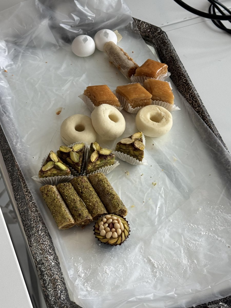 Yi123cd's tweet photo. At noon, my colleague made some delicious treats at home: one was a pine nut macaron, and the other was a chestnut pastry dessert shaped like a little bird's nest. They were both exquisite and tasty!☺️ https://t.co/6kqVNDduyY