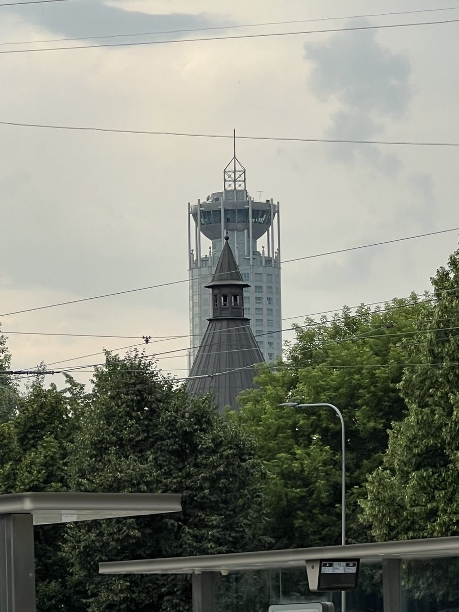 alleshov's tweet photo. The old spire rises through the leaves, the modern tower stands beyond the wires.
It is the quiet art of seeing time layered upon time…
#Moscow #WaysOfSeeing #MoscowAesthetics #Russia #Москва #ЭстетикаМосквы #ИскусствоВидеть https://t.co/Frux9nAm9t