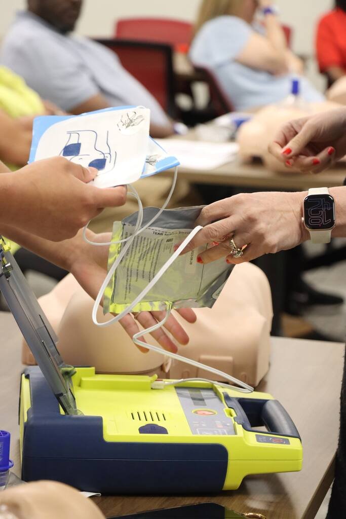 MarshallISD's tweet photo. Getting ready for a great school year starts with being prepared. Our administrators sharpened their lifesaving skills with  CPR Training at the MHS Professional Development Lab. Here's to a safe and successful year ahead. ❤️ 

#BackToSchool #CPRTraining #SafetyFirst https://t.co/rNMogq6MJE