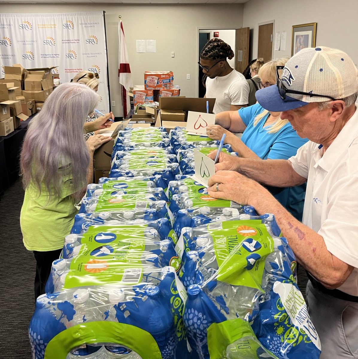 SRA_Florida's tweet photo. Our work at SRA is made possible thanks to support from community partners like @ORRFoundation.

This summer, volunteers with the organization joined our team to pack storm kits for Hurricane Ian victims who are continuing to feel the impacts of the 2022 storm. https://t.co/tTSUXN38l9