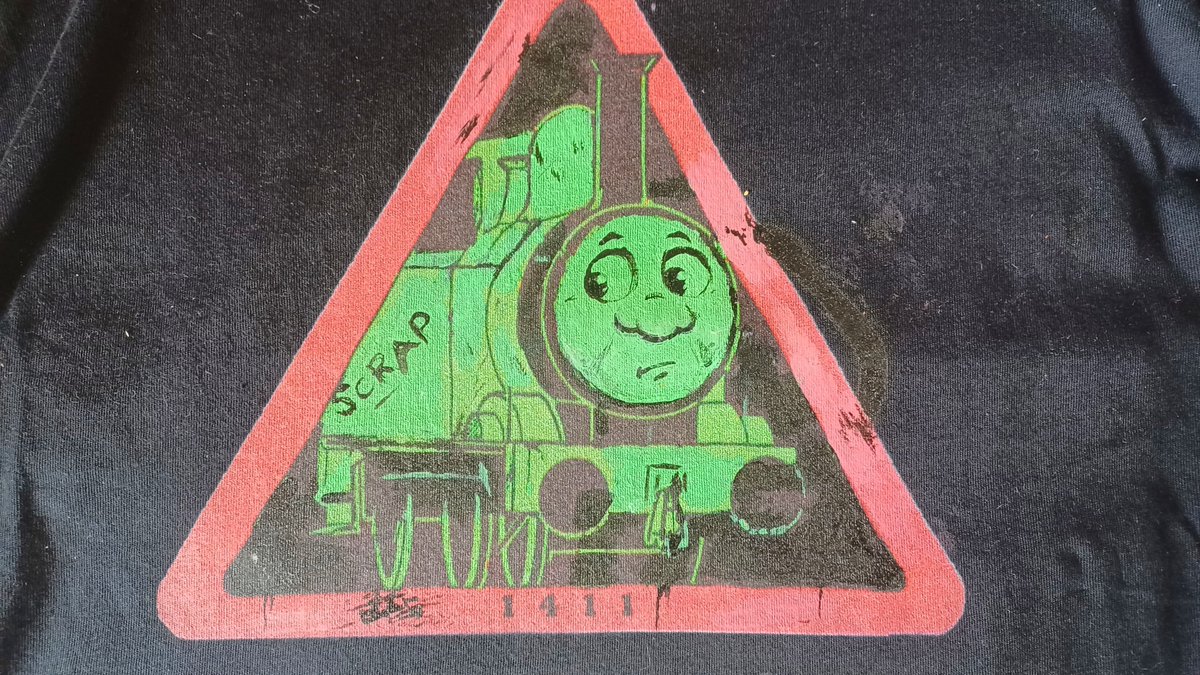 SeaSwine9's tweet photo. Well I DID paint over my old Sodor Fallout Oliver shirt to make him regular flavour, the instructions on the fabric medium being non existent means it completely washed out, so I now have to start over https://t.co/55hWv9LCWA