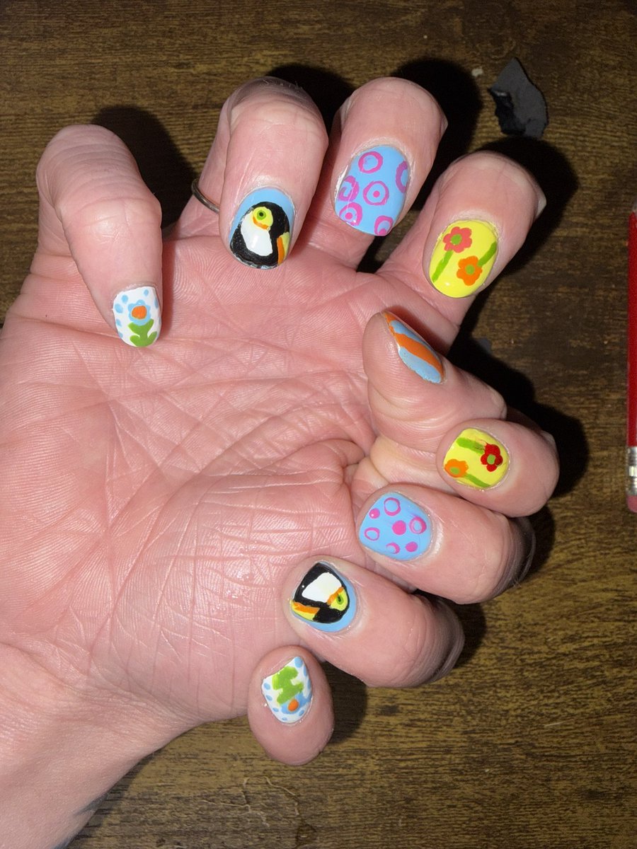 777adybug's tweet photo. put toucans on my nails :P https://t.co/BjrJ9mvYBT