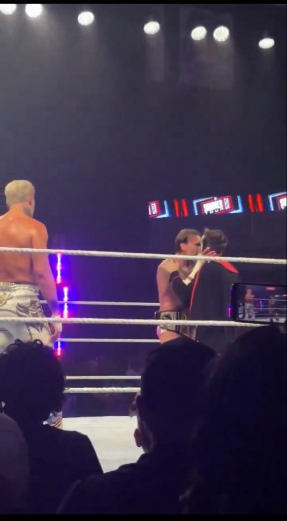 Faithyroyal's tweet photo. CM Punk &amp; Cody Rhodes kissing Danhausen still feels so unreal. https://t.co/pkJxs8DtZY