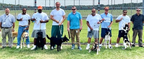 VADOC's tweet photo. In Case You Missed It:

Coffeewood Canines is a program where incarcerated individuals who are selected to serve as handlers train dogs from the Orange County Animal Shelter to prepare them for their furever homes. To date, more than 100 dogs have found their furever home. https://t.co/LgoiUjQg2s