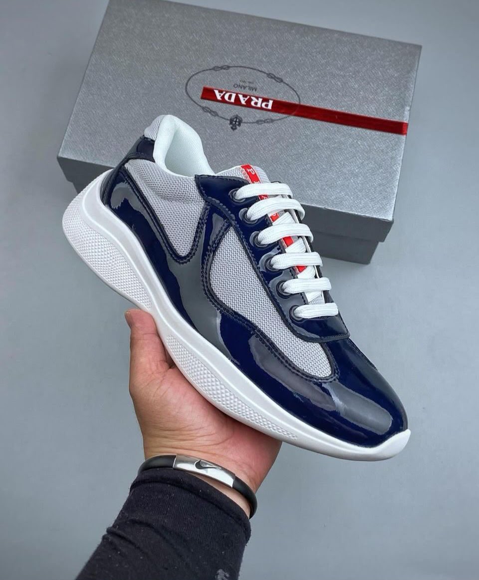 footcasehq's tweet photo. The Prada America’s Cup silhouette has remained one of luxury fashion’s most recognisable sneaker designs for years.

With its sleek profile, premium-inspired construction, and timeless styling, it’s a favourite for those who appreciate understated luxury. https://t.co/cmFVdtCEwT