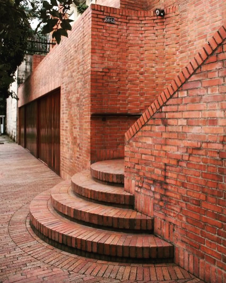 david_perell's tweet photo. People say it’s too expensive to build things beautifully, but look at all the beautiful things you can do with bricks.

Effort and creativity are the ultimate constraint, not money. 

And the extra work is worth it because life is so much lovelier and more delightful when our streets are filled with craftsmanship.
