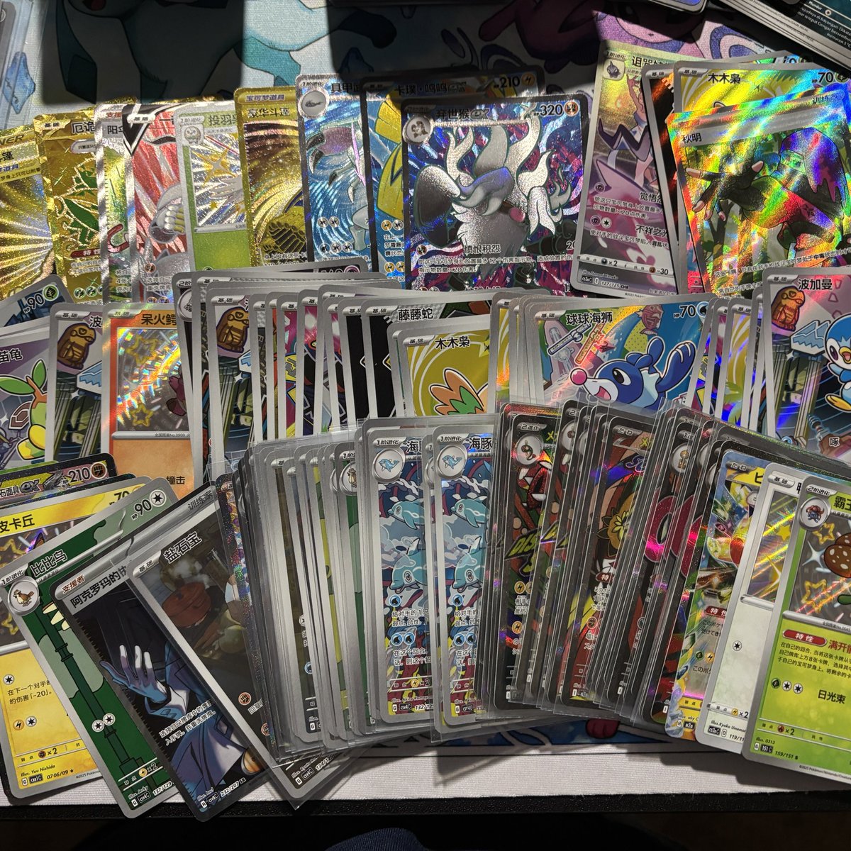 CardGameNomad's tweet photo. So… @coronetpokestop and myself made a trade &amp; he said he was sending some stuff to give to students who like Pokemon.

I had no idea “some stuff” was packs and 100s of singles including ~30 first partner promos. 

The students will absolutely love all of these!

FOLLOW HIM!!! https://t.co/dCNNfciHuG