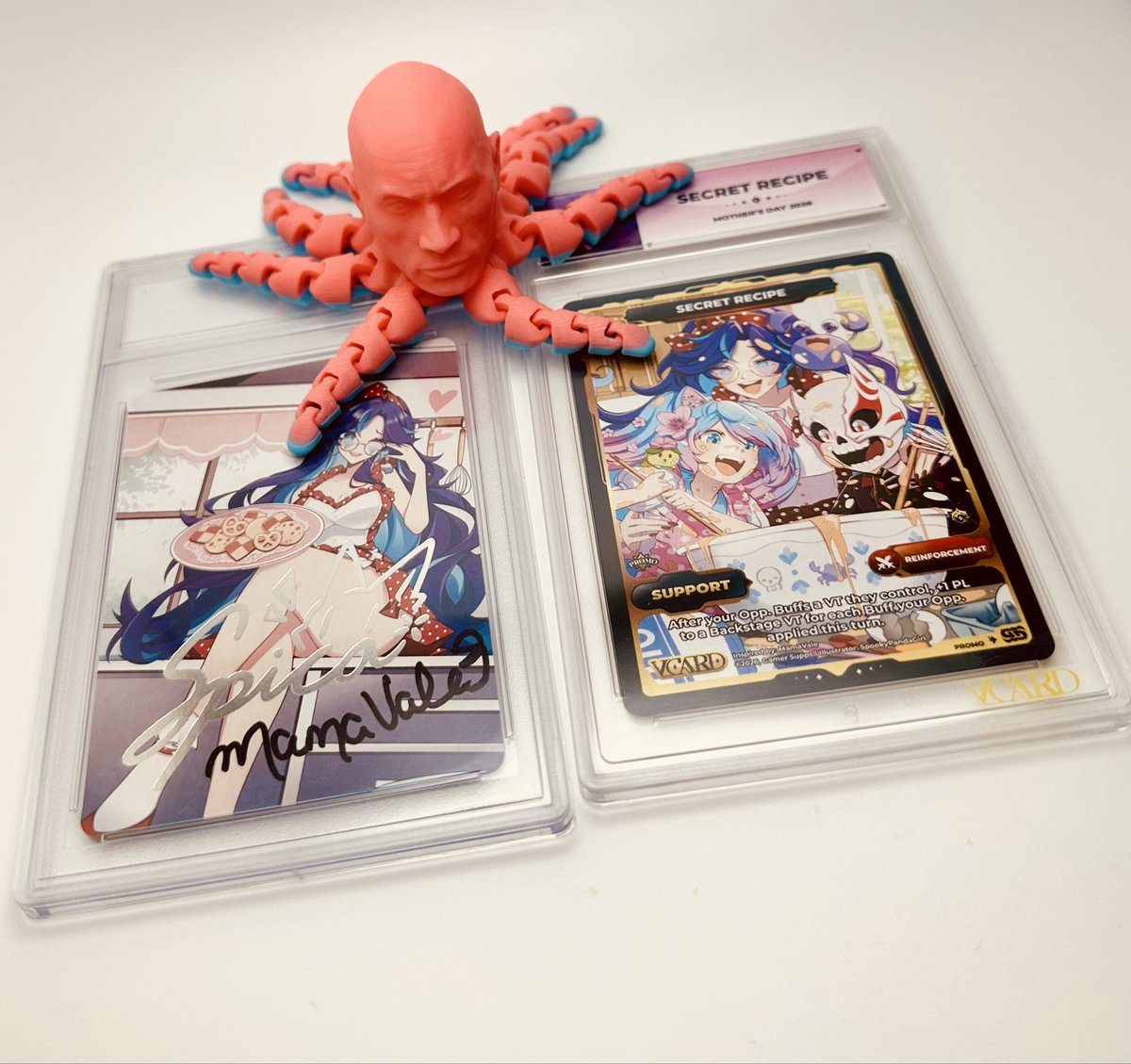 Daegarde's tweet photo. My secret recipe card came in. The art is so beautiful it captures the family bonding moment. And just flexing the signed box topper by THE @_mamavale . Ignore the rocktopus. https://t.co/7QhPSDTEwN