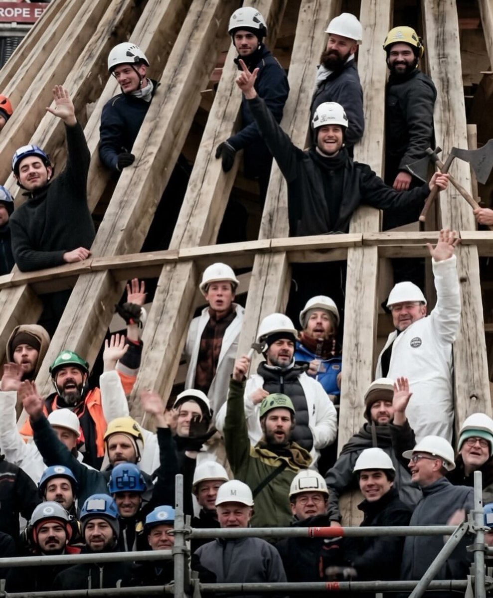 historyinmemes's tweet photo. A carpenter who helped restore Notre-Dame after the devastating 2019 fire was granted permission to marry inside the cathedral, becoming part of its first wedding ceremony in 30 years.

A remarkable exception was made when 29-year-old master carpenter Martin Lorentz was allowed to marry his fiancée, Jade, inside Notre-Dame Cathedral in Paris. Lorentz had spent three years hand-carving the massive oak beams used to rebuild “the Forest”—the cathedral’s intricate medieval roof structure, which was destroyed in the devastating 2019 fire. Because Notre-Dame is classified as a national monument rather than a parish church, private weddings have been prohibited for decades, making theirs the first ceremony held there since 1995.

In recognition of Lorentz’s dedication to the cathedral’s restoration, Archbishop Laurent Ulrich personally granted the rare permission. Around 500 guests attended the ceremony, including family, friends, and many of the craftsmen who helped bring Notre-Dame back to life. As the newlyweds left the cathedral, Lorentz’s fellow carpenters formed a traditional guard of honor, raising their axes overhead in a moving tribute to the man who helped rebuild one of France’s most treasured landmarks.