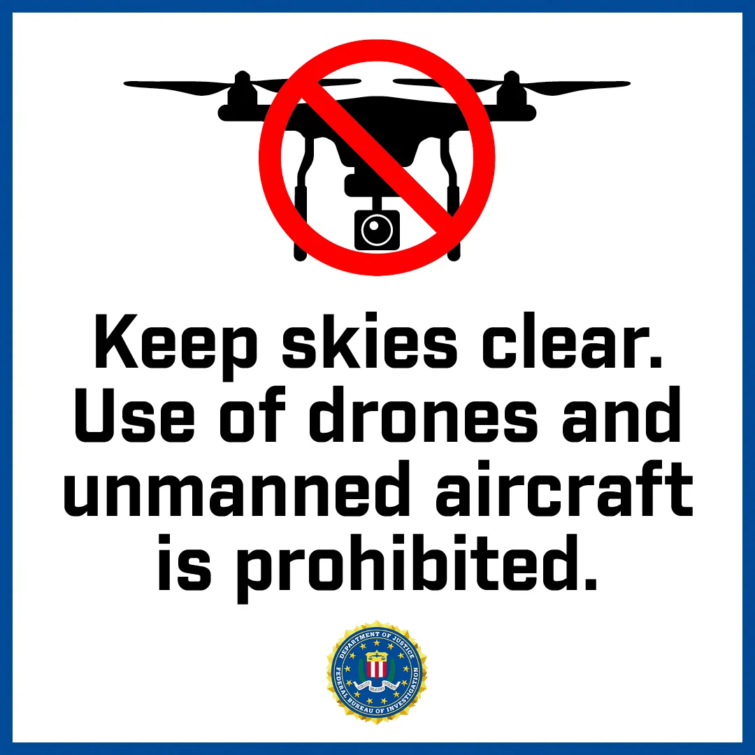 A drone is depicted crossed out above text that reads: "Keep skies clear. Use of drones and unmanned aircraft is prohibited." The FBI's official seal is centered at the bottom of the text.