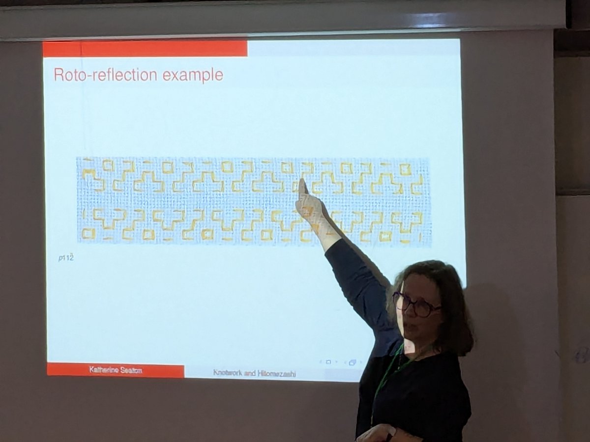 msmathcomp's tweet photo. The second afternoon session at the @BridgesMathart conference is "Hitomizashi Galore": The first talk is by Katherine Seaton on "Interleaved Friezes: Celtic Knotwork and Hitomezashi." (https://t.co/LXZhaEBub4) She talks us through which Friezes can be done via Hitomezashi. (1/2) https://t.co/NNO4NlLCyl