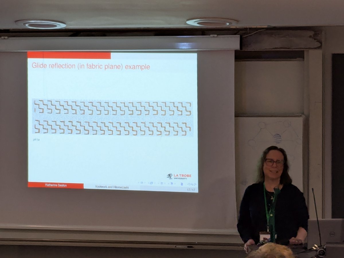 msmathcomp's tweet photo. The second afternoon session at the @BridgesMathart conference is "Hitomizashi Galore": The first talk is by Katherine Seaton on "Interleaved Friezes: Celtic Knotwork and Hitomezashi." (https://t.co/LXZhaEBub4) She talks us through which Friezes can be done via Hitomezashi. (1/2) https://t.co/NNO4NlLCyl