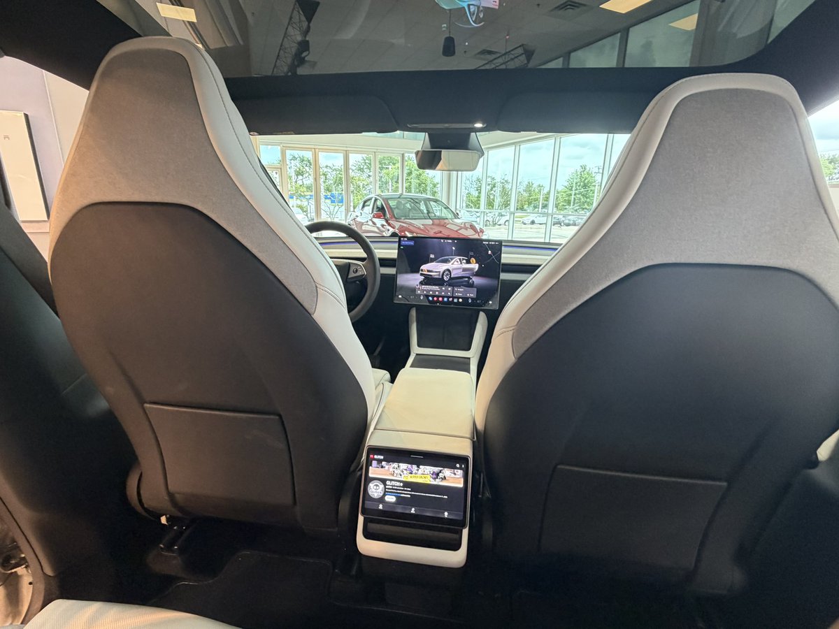SDembraski's tweet photo. Stopped in to Naperville IL Tesla to show my wife the Model YL 

She’s really excited to get her new YL

We checked out the space in the 3rd row and both of us can sit back there comfortably. Plenty of headspace. 

Our delivery date currently is Sept 13-29th or somewhere in there.