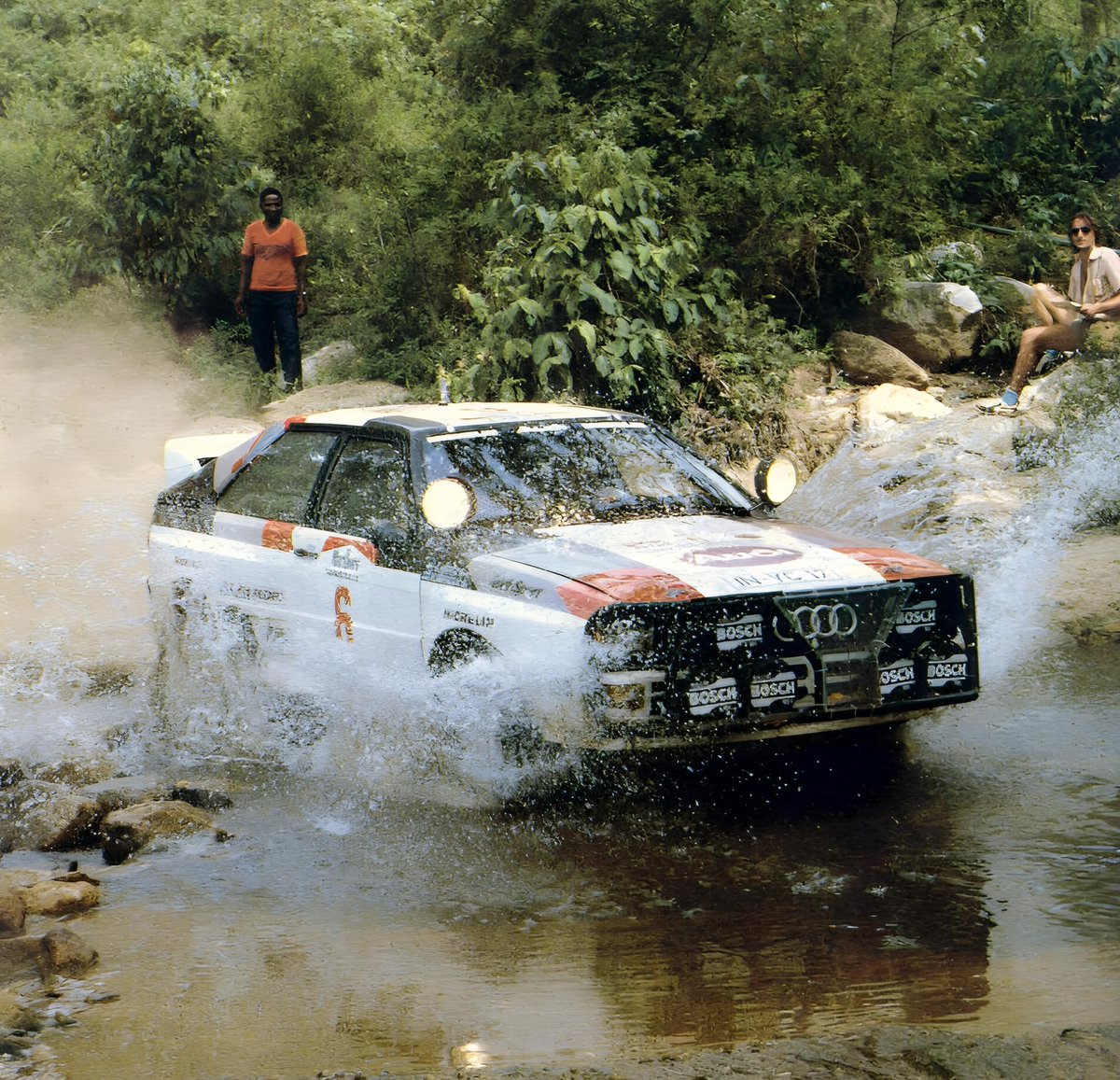 racing_culture's tweet photo. The legendary Audi Quattro A2 tearing through a river crossing in the 1983 Group B era. With its iconic turbo 5-cylinder engine and revolutionary AWD, this beast (plate IN-YC 12) rewrote the DNA of motorsport history. 🏁🔥 #AudiQuattro #GroupB https://t.co/ZX2p6y9FPq