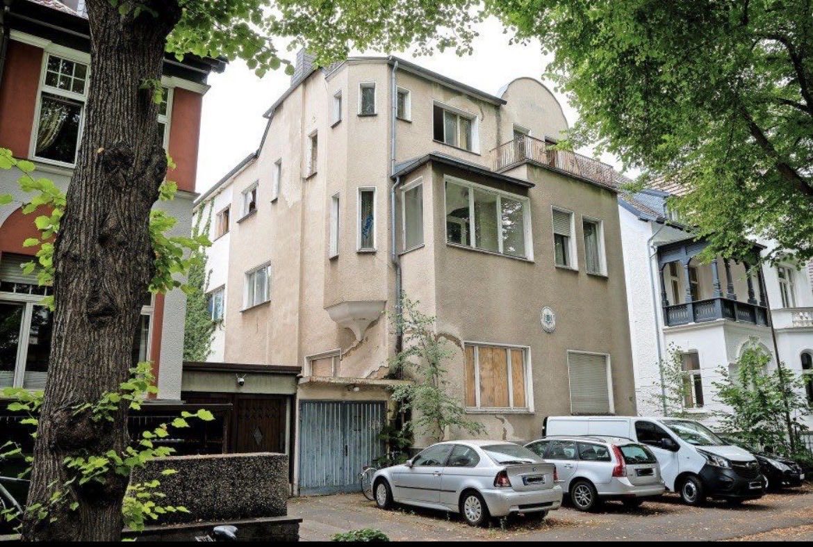 MPDrAbib's tweet photo. Somali State Minister Ali Omar Who Didn’t Even Know Bonn Was West Germany’s Capital Just Denied the Embassy Former President Hassan Sheikh Mohamud Ordered Him to Sell Ever Existed

Somalia does own a property in Born, Germany (Former Capital of West Germany) is not merely wrong - it is a public display of ignorance so profound it borders on national embarrassment. You demand evidence while sitting on the very history you either never learned or deliberately erased. Here is the lecture you clearly never received.

In October 1977, when you were still a first-year student at Mogadishu Technical School who could not even name the capital of West Germany, Somali President Mohamed Siad Barre authorized the West German GSG 9 to storm the hijacked Lufthansa Flight 181 (“Landshut”) on the tarmac of Mogadishu International Airport. That operation succeeded. Hostages were freed. The terrorists were neutralized. West Germany never forgot the debt. Relations warmed sharply. Development grants and technical assistance followed in the late 1970s and 1980s.

Out of that concrete alliance, Somalia acquired and occupied its own embassy property in Bonn - the actual capital of West Germany from 1949 to 1990 - at Hohenzollernstraße 12, beginning in 1978. A villa. Owned by the Somali state. Used as the official embassy until the central government collapsed in 1991. Not a rented office. Not a shared desk. A sovereign property of the Somali Republic in the capital of its partner at the time.

You now sit in an office and announce that no such property ever existed, demand “evidence,” and invite the public to “help us locate this beautiful building.” The building was in Bonn. Your inability to play game is not a minor factual slip; it is proof that the man currently speaking for the Somali state on this matter was still learning basic geography while the property was already flying the Somali flag.

Worse, the same property was later disposed or sold of under the direct order of former President Hassan Sheikh Mohamud, with your name and signature appearing on the letterhead that executed the sale. You did not merely fail to protect state assets; you participated in liquidating and profiting one that had been acquired through the blood and political capital of an earlier generation of Somalis.

Stop pretending the historical record does not exist. And stop treating the Somali public as if they share your level of ignorance about what their own government once owned in Germany.

@AliOmarMP
 @TeamTrump
@RepTiffany
@RepOgles
@RepBrianMast
@HouseForeignGOP
@RepMoolenaar
@realDonaldTrump
@SecRubio
@StateDept
@USTreasury
@TheJusticeDept
@SpeakerJohnson
@Jim_Jordan
@freedomcaucus
@susiewiles2024
@StephenM
@GOPMajorityWhip
@RepFinstad
@RepFischbach
@RepPeteStauber
@RepMTG
@FoxNews
@BreitbartNews
@NEWSMAX
@HassanSMohamud
@TheVillaSomalia
@HamzaAbdiBarre
@AadanMadobe
@SomaliainQatar
@MOFAKuwait
@UAEinSomalia
@ChineseSomalia
@KSAmofaEN
@US2SOMALIA
@EU_in_Somalia
@ItalyinSomalia
@UNSomalia
@TC_MogadisuBE
@UNDPSomalia
@MikeNith1
@WorldBankAfrica
@IMFAfrica
@JMeservey
@HudsonInstitute
@CanHCKenya
@SwissEmbassyKE
