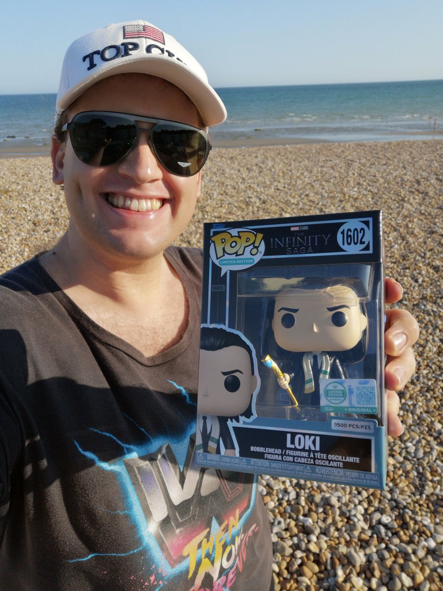 RealCharlieOgle's tweet photo. Fun in the sun for me and my new @FunkoEurope Loki bobblehead on the beach! 🌞 Thanks @hmvtweets for making us feel glorious with purpose! 🍦 https://t.co/vt2VKGFHWF