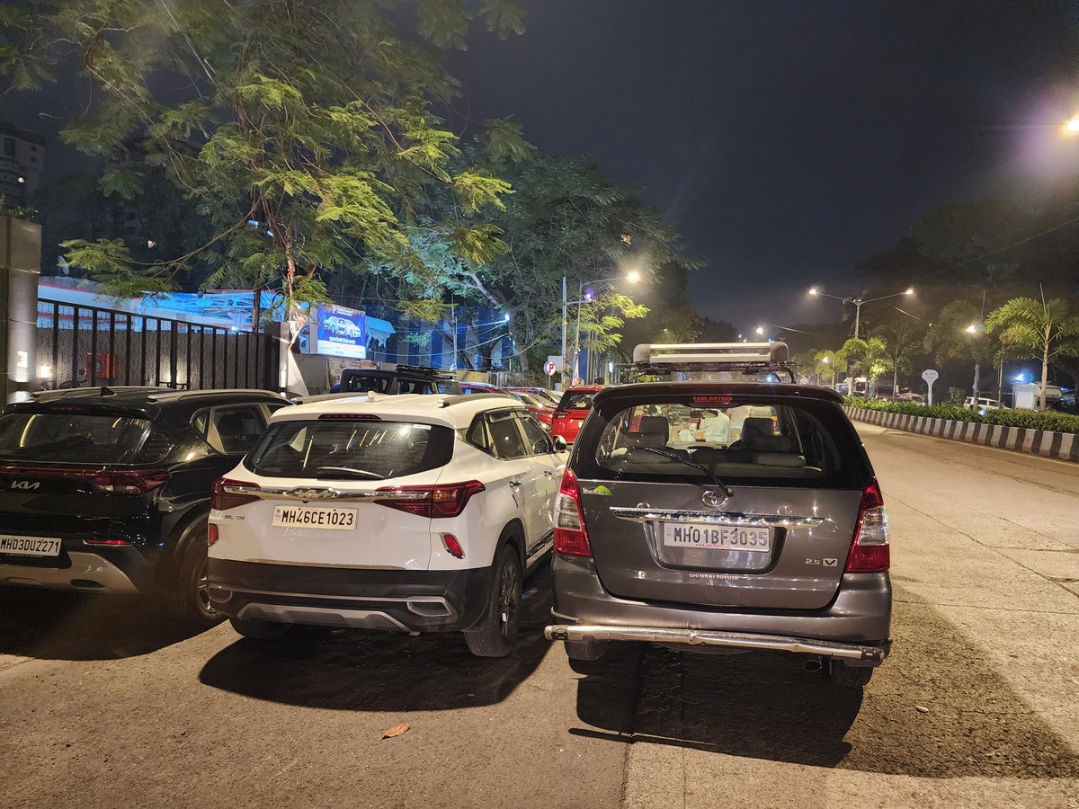 only_ashu's tweet photo. Blatant lawlessness on CG Road, Chembur! Yash Motors is taking @MumbaiPolice for a ride by converting public roads into a private showroom yard. Commercial stock is parked right under a "No Parking" sign!  @MTPHereToHelp @mybmc @CPMumbaiPolice @mumbaitraffic #Encroachment https://t.co/jwoZvzTH98