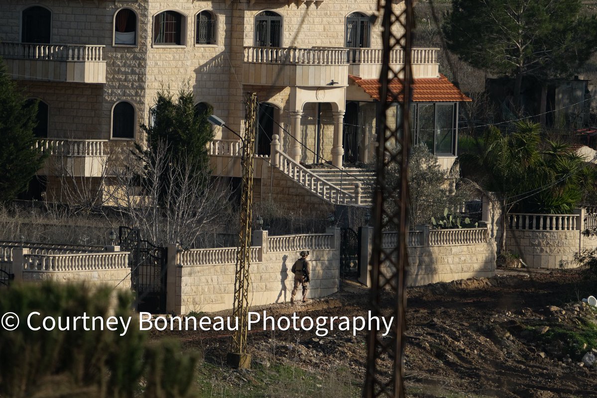cbonneauimages's tweet photo. Here are photos I took in February of 2025 of Israeli soldiers walking house to house in the town of Yaroun, Lebanon. They were rigging homes with C4 explosives for multiple days in a row; taking the day to rig them and then detonating them in the evening. They flattened several neighborhoods during the period of time. 

In the photos you can see IDF soldiers wiring the homes and carrying C4. You can also see a truck transporting a large amount of the explosives.

This was not self defense. Each detonation is an act of genocide.
