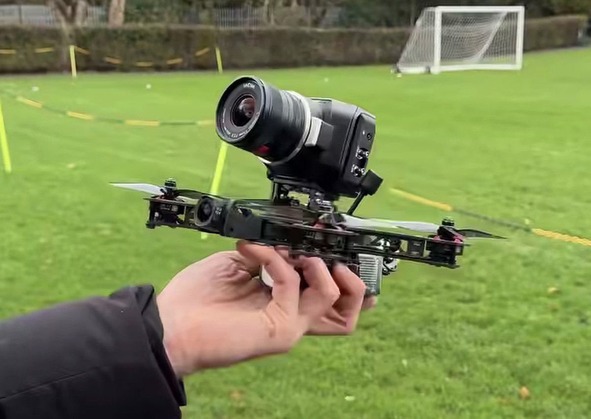 Shepherd_Photo's tweet photo. Custom built drones put the cameras on top a vast majority of the time. 

SpaceX isn’t using an off-the-shelf drone to capture their footage. They build out everything custom for their needs. 

It’s easier to mount the camera on top of a drone when you want to use something larger than the tiny cameras that come pre installed on most camera drones. 

I can tell you immediately went straight to commenting and did zero research on anything related to drones before pushing Post 😂