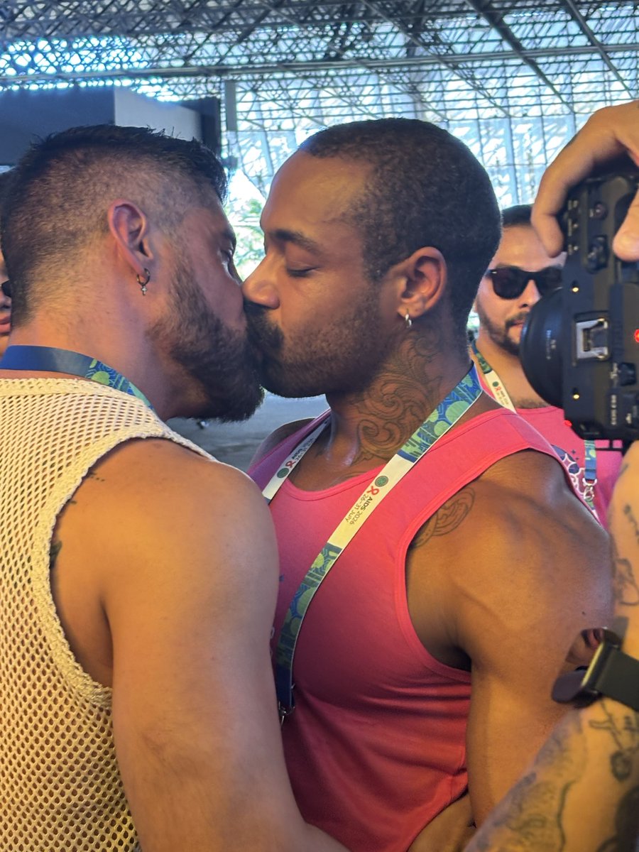 neolithicrumba2's tweet photo. Today I met @shogosensei1 and on Instagram @AcepGates both with @mpactglobal Ending HIV stigma with their Kiss-in action just outside the Global Village @iasociety @AIDS_conference #HIV #NoShame #PLWH https://t.co/WGp4QFuSSl