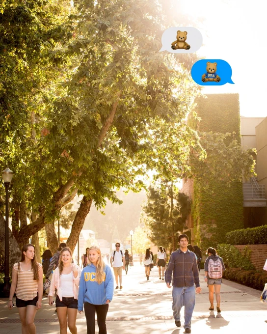 Students walking on a sunny, tree-lined campus path with ivy-covered buildings. A speech bubble with a teddy bear emoji and another with a bear emoji float above.