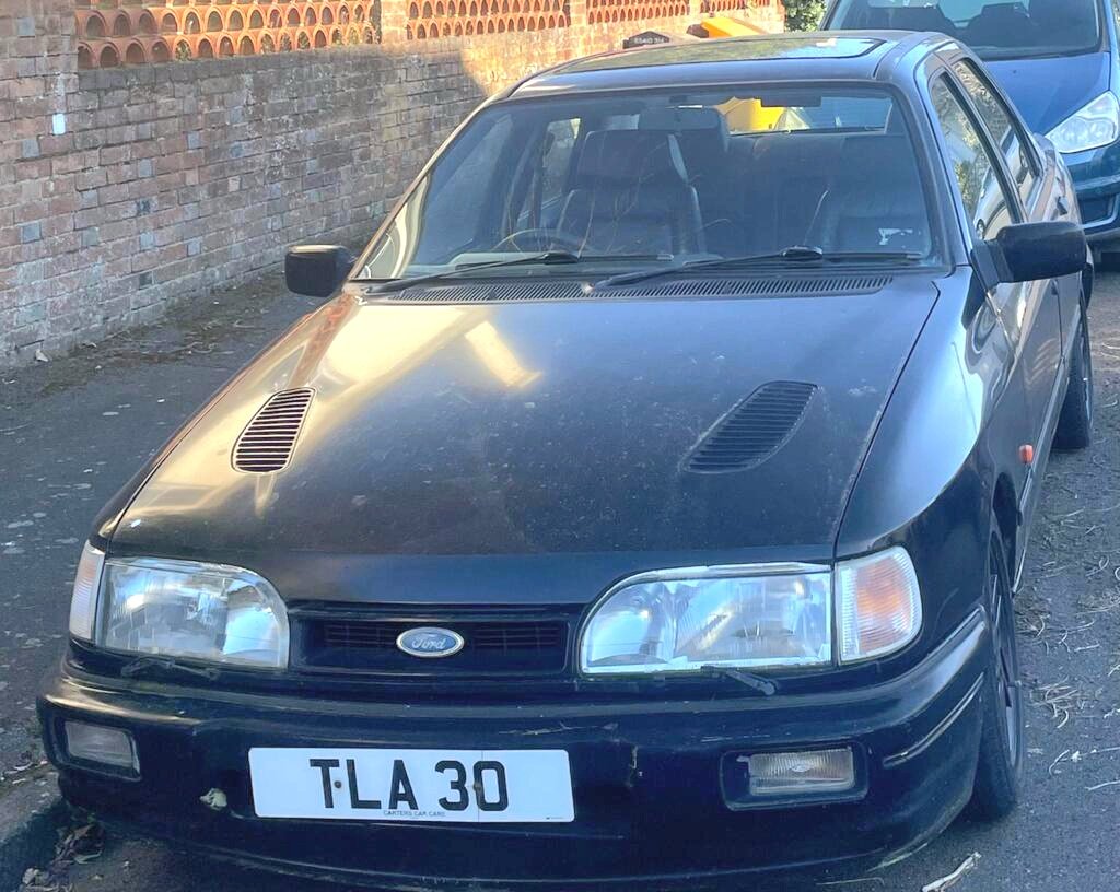 StolenOSFs's tweet photo. Black #Ford Sierra #Cosworth #TLA30 #STOLEN #Dorking #Surrey 27/7/26 #stolenosfs @SurreyRoadCops @SurreyPolice @stolen_in @StolenVehicleUK @UkStolen @ukstolenvehicle @itsbeenstolen https://t.co/TBJZlViHOx