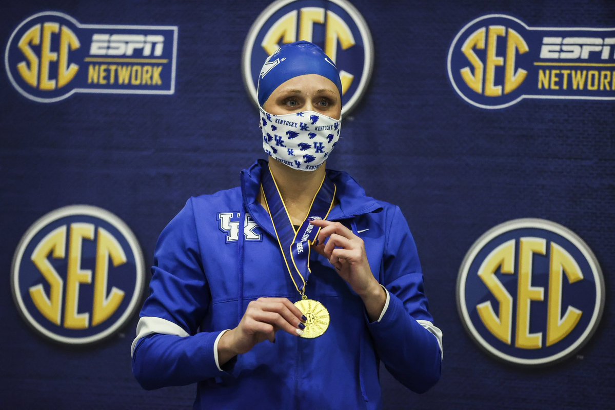 Riley_Gaines_'s tweet photo. So many memories and pictures tainted by these stupid masks. We were forced to essentially waterboard ourselves every day. 

This is how I had to accept my SEC Championship in the 200 freestyle my junior year. Such a shame. https://t.co/7zITumDVzv