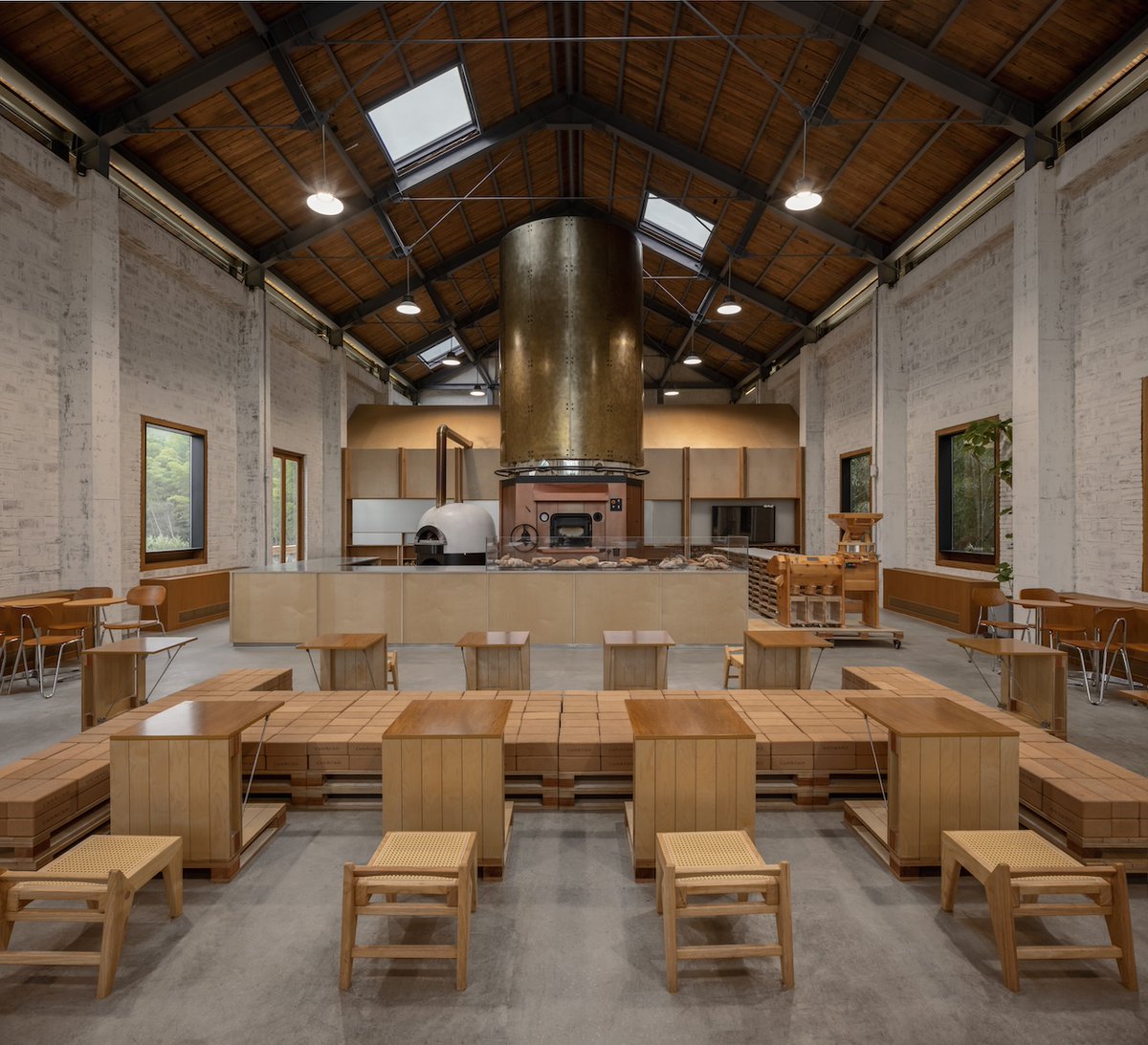 Architizer's tweet photo. Simple materials, local craftsmanship, and a ceiling-height stone oven transform a former village auditorium into a contemporary bakery.

📍 Shaoxing, China
Project by: Tens Atelier
Details: https://t.co/ha0qvNBnSN https://t.co/0VrvbiMpaE