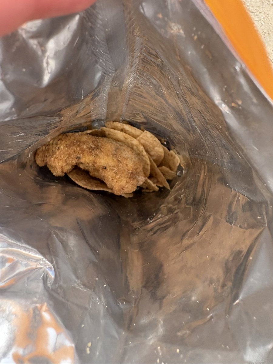 koolaid2207's tweet photo. @Tostitos I ate one chip &amp; it was absolutely disgusting. Went to grab another to see if it was the same, low &amp; behold. A CHICKEN TENDER 😂😂 Please explain. The bag in general smelled disgusting.  #SOS https://t.co/ta3msM1Xdy