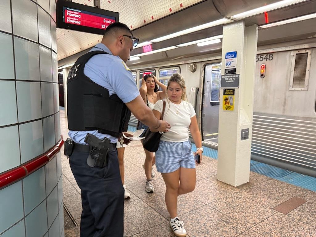 CPDTransit's tweet photo. Public Transportation Section Officers at Grand redline conducting safety awareness outreach for the ridership. @Chicago_Police @CPD_BCT https://t.co/WKhl8ZOVCU