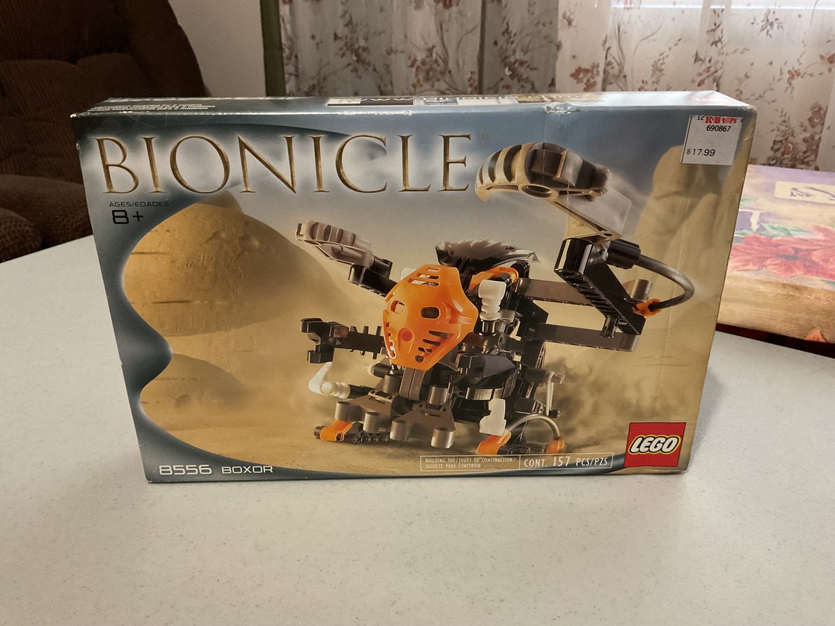 LowResKitty's tweet photo. The Bionicle Boxor vehicle (with Nuparu) has arrived to make a brave stand against the Bohrok swarms!

The Lego Catalog's ad for this set said "Includes Matoran." As a kid, I used to pronounce Matoran like "Matt-Er-Ran" until Mask of Light came out. 😏

This is Part 5/8. https://t.co/w4JxbVAWbQ