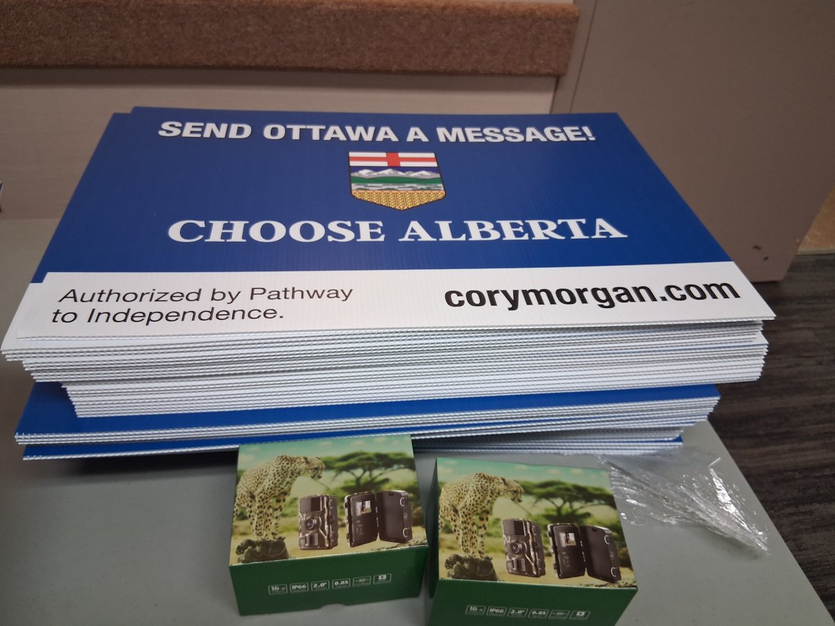 CoryBMorgan's tweet photo. Giving out signs (and speaking) in Beiseker tonight.

Also have cameras for those whose signs have been chronically vandalized or stolen.

We will catch offenders and make them internet famous. https://t.co/JgB7hCmZFB