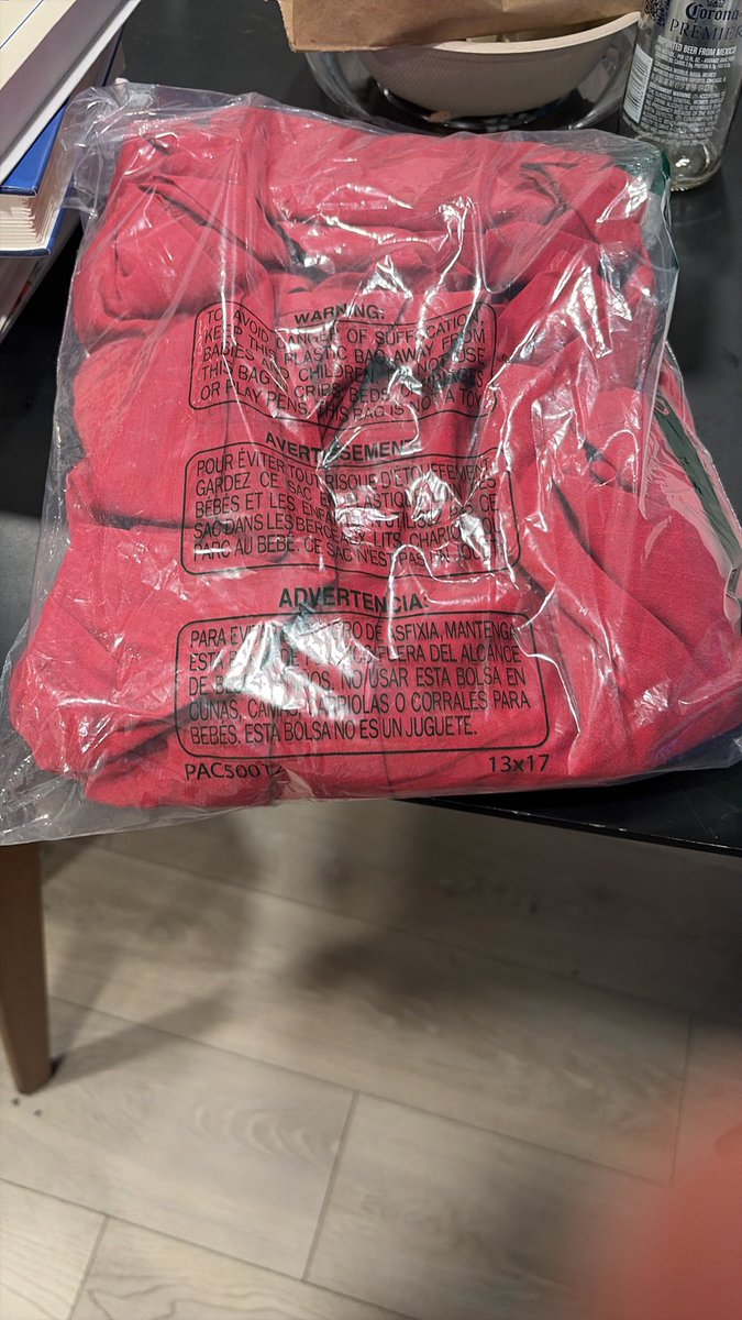 sarahmccammon's tweet photo. I’m traveling for work and my husband told me that a dress I ordered arrived in the mail.

I asked him to send me a picture of it.

This is what he sent me. 🤣🤣🤣 https://t.co/PR4f3iZX5T