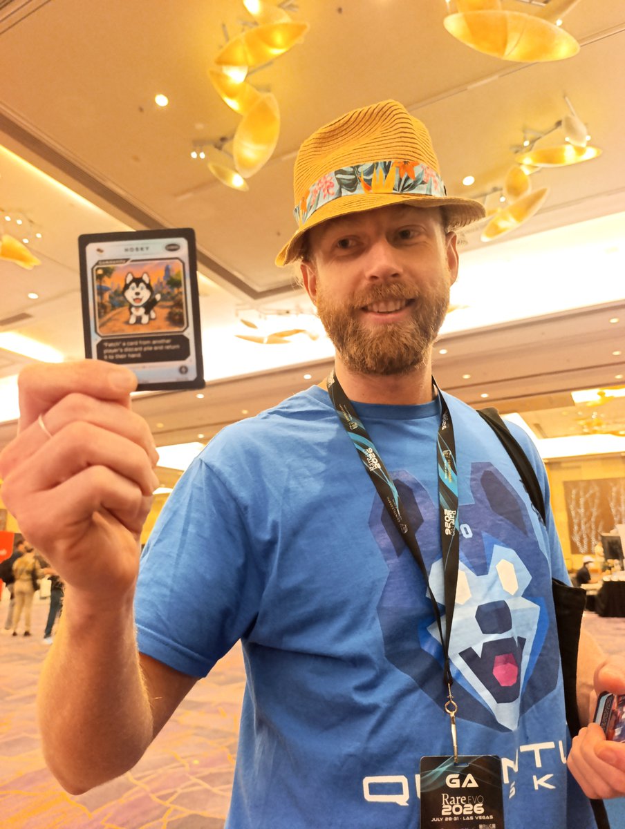 expatboogie's tweet photo. @Daniel888Br with the lucky @HOSKYFetch card pull, from a trading card game pack made by the @SundaeSwap team, and given out here at their @RareEvo booth! https://t.co/VthXUPrafU