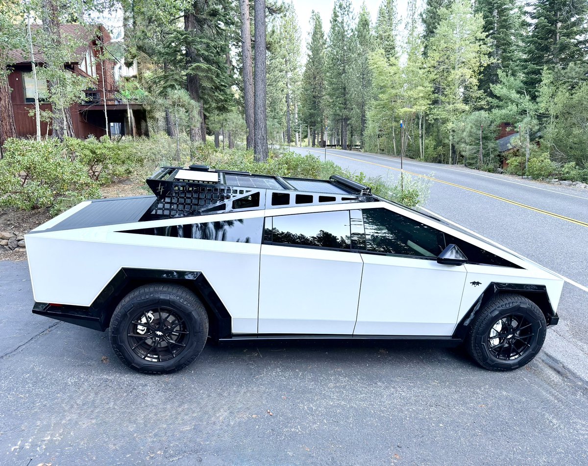 ThTslaDude's tweet photo. Cyberbeast, Charlie, showing off his Starlink and solar panels, lamenting his last day in Tahoe for a while. https://t.co/5Au7PyPwsG