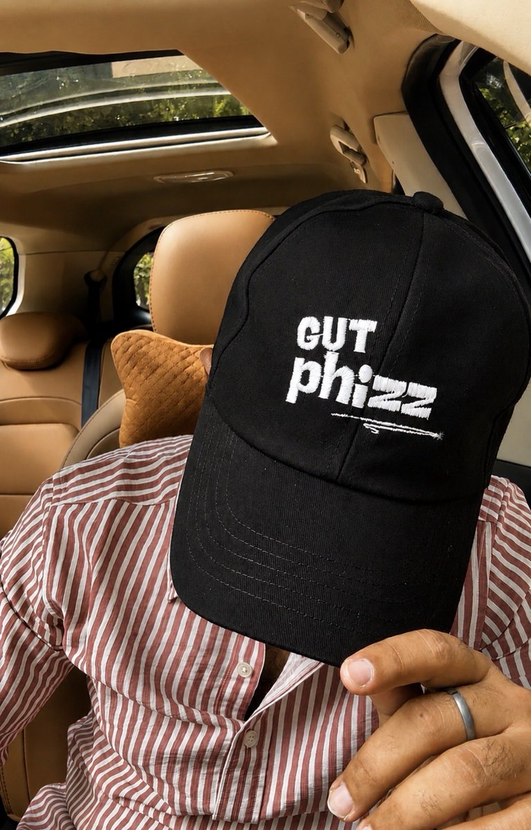 radhika___arora's tweet photo. Merch shouldn’t just be a walking advertisement. It should actually look cool. When we started designing the first batch of Gutphizz merch, we had one rule: create pieces that people would actually want to wear out on a casual day, not just toss in the back of their closet.

So we built a collection around who we are,every design tells a piece of our story:

Denim🧢: ��hot girls trust their gut” (because intuition + gut health = unbeatable energy)

Red🧢: “disclaimer: not sugarcoated!” (because just like our drink has zero added sugar, our personality isn't sugarcoated either- we say what we feel and don't try to fit in)

Brown🧢: “foodie club” (for everyone who loves great food and wants a gut that can handle it)

Black🧢: Classic Gutphizz logo cap (clean, minimalist, everyday essential)

Which one are you picking first? 1, 2, 3, or 4? Let me know in the comments!👇

(p.s.- who knows, you might just get one of these as a gift on preorders from our end... so don’t forget to join our waitlist!)

Waitlist: https://t.co/5wJfu4jYRR