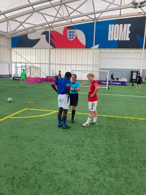 Street Reds participants take part in the Premier League Kicks Cup final.