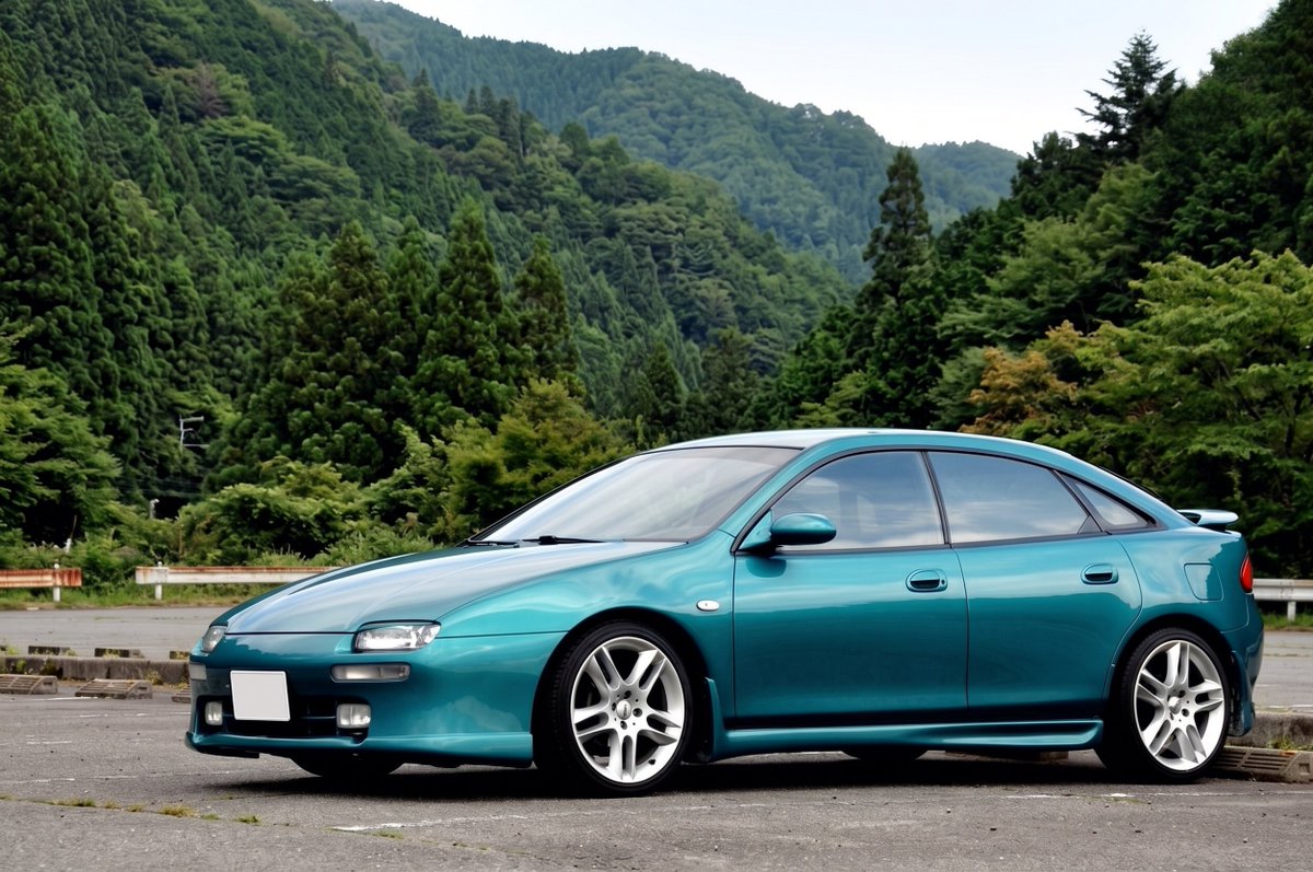 UPGARAGE_com's tweet photo. 【#アプガレ車好きクイズ】
V6エンジンを搭載したFFの5ドアハッチバッククーペ！？この車は何でしょう？🙃
#車好き https://t.co/HtNbYlKy1D