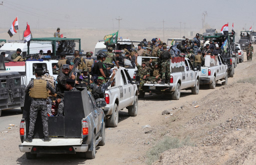 arabnews's tweet photo. #SPOTLIGHT: From Kataib Hezbollah to Asaib Ahl Al-Haq, Iran’s proxies have grown into powerful military &amp; political forces holding Iraq’s future hostage  https://t.co/MwcaKZLmsZ https://t.co/K974OnVTnZ